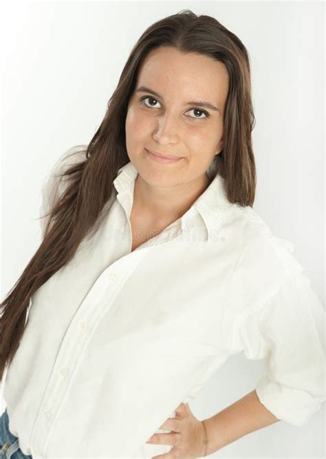 Smiling Long Haired Brown Haired Mother In A White Shirt With Her