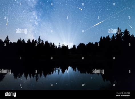 Falling Stars Lake Pine Trees Silhouette Milky Way Stock Photo Alamy