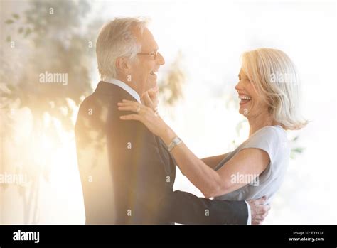 Smiling Older Caucasian Couple Dancing Stock Photo Alamy