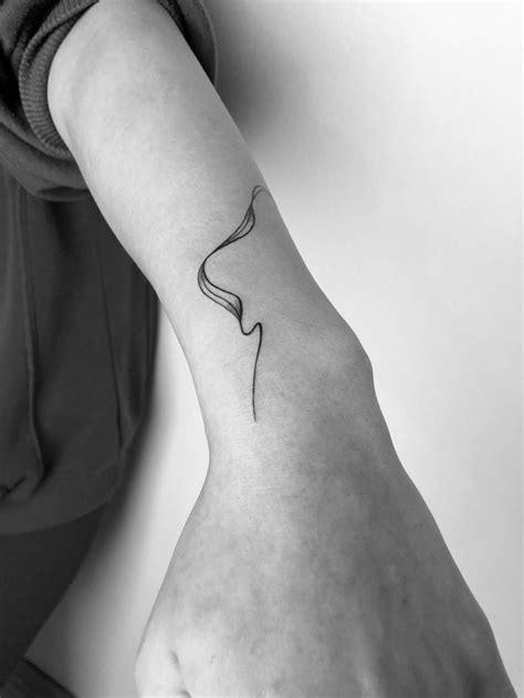 Elegant Abstract Flow Tattoo