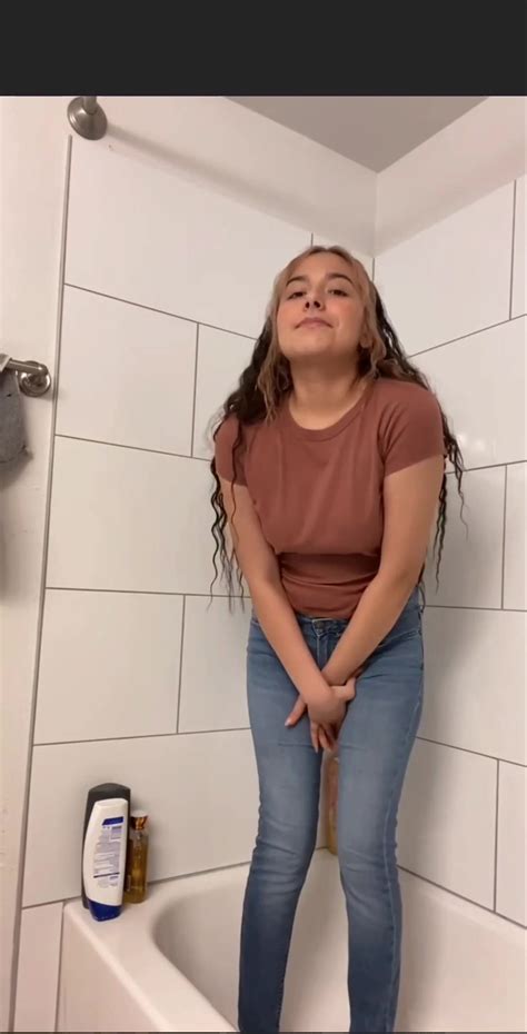 Pissing Cute Latina Peeing Her Jeans
