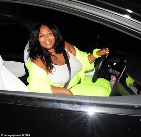 Lizzo Shows Off Her Curvy Physique In A Neon Green Pants After Enjoying