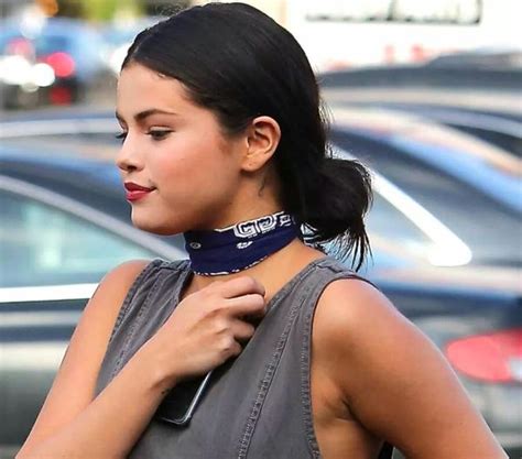 A comprehensive guide to selena gomez's surprisingly extensive tattoo collection. Selena Gomez Shows Off New Behind-the-Ear Neck "g" Tattoo ...