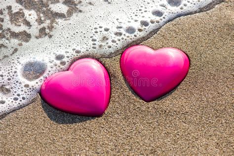 Two Red Hearts On The Beach Symbolizing Love Stock Photo Image Of