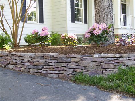This Little Stacked Stone Wall Is Being Used To Prevent