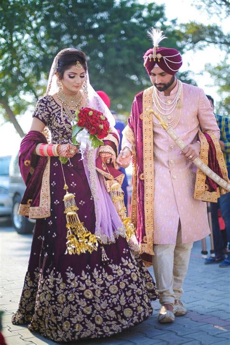 image 50 of punjabi couple in wedding dress metallicmode
