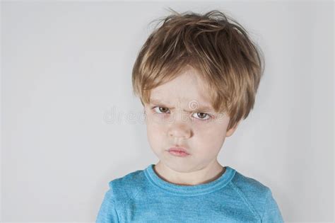 Angry Boy Frowning Looking Forward Light Background Closeup Stock