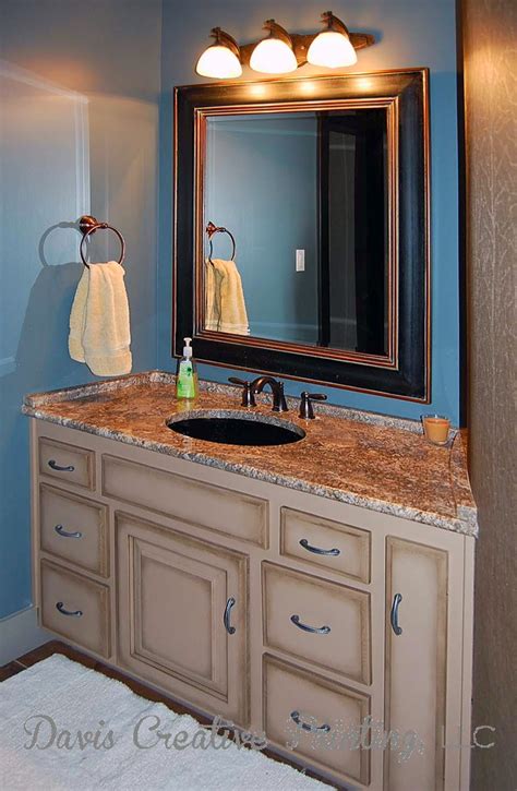 Bathroom vanities add an elegant touch while also offering a convenient place to get ready for your day. Davis Creative Painting: Painted Oak Bathroom Vanity