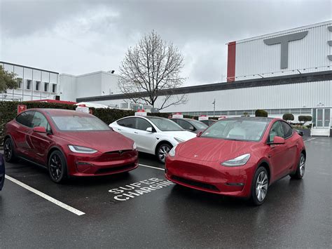 Teslas New Ultra Red Color Side By Side With Old Multicoat