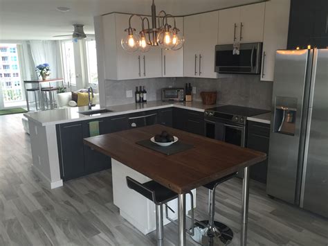 In order to combine practicality and style, we recycle the cabinets of our ikea kitchen to upgrade them with doors and other accessories specially designed to adapt to the swedish giant. Design Flair for a High-Rise Condo IKEA Kitchen