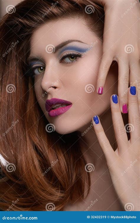Multi Colored Nails Portrait Of Beautiful Women Showing Her Multi Colored Manicure And Looking