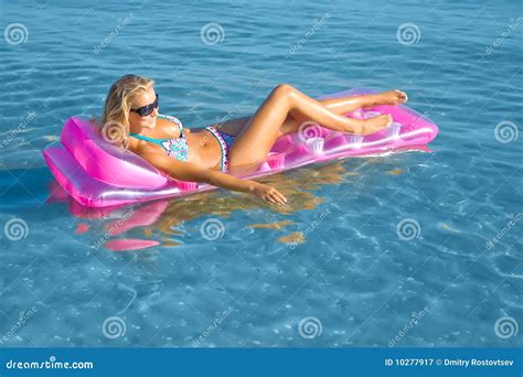 Blonde Woman With Inflatable Raft Royalty Free Stock Photography Image