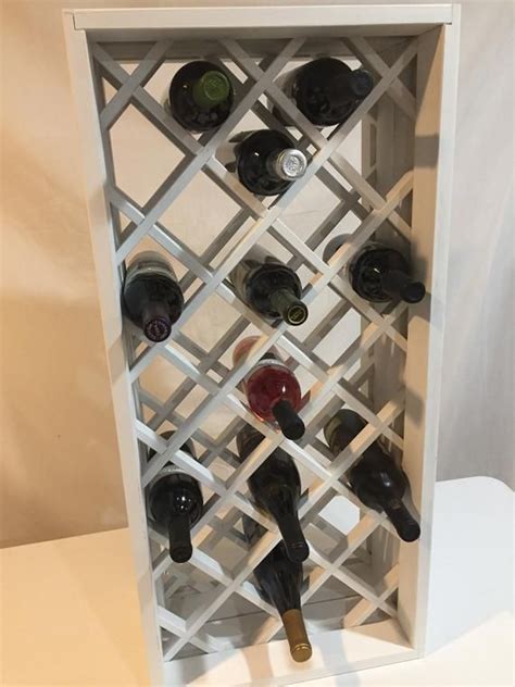 Grab a stack of double walled heat ducts and a mig welder, and find a place to bring a diy. Wood Diamond lattice wine rack insert style | Etsy | Wine rack, Custom wine rack, Diy wine rack