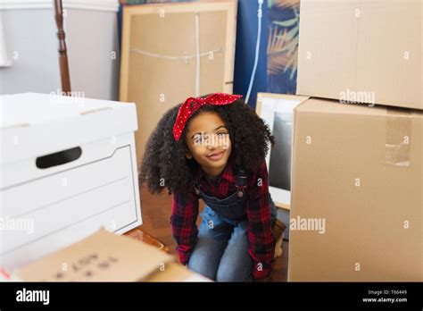 Portrait Happy Cute Girl Among Moving Boxes Stock Photo Alamy