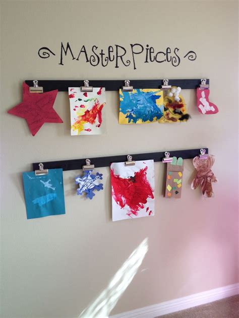 Fun Way To Display Kids Art Work We Just Hot Glued Clips On A Stained