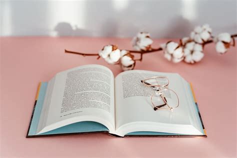 Hd Wallpaper Open Book On A Pink Background Reading Glasses