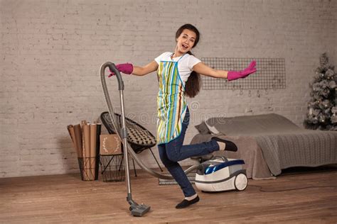 Happy Woman Cleaning Homedancing With Vacuum Cleaner And Having Fun Copy Space Stock Image