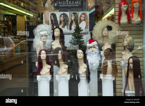 The cost of starting a proper business is. Wig Shop Stock Photos & Wig Shop Stock Images - Alamy