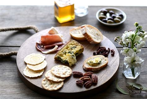 To ensure a mixture of flavors, make sure to include at least one goat, blue, or aged cheese. How To Make The Perfect Cheese Platter - B. Lovely Events