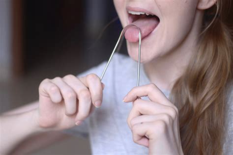 How To Clean Your Tongue Tongue Cleaning Benefits Reality Paper