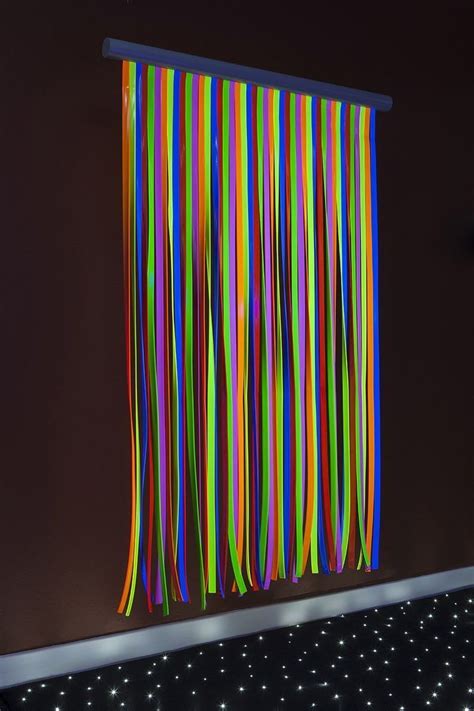 This Wall Mounted Ultraviolet Waterfall Produces An Amazingly Bright