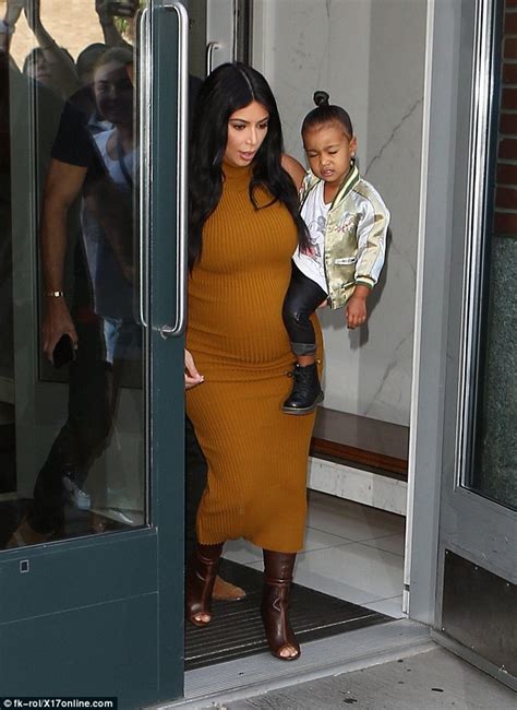 Pregnant Kim Kardashian Squeezes Into Another Skintight Dress