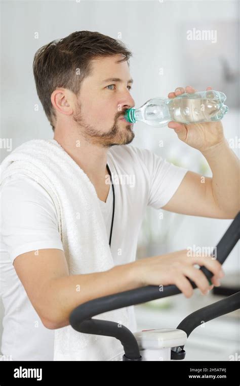 Man Drinking Water During Exercise Stock Photo Alamy