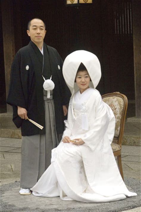 Though it isn't required, some japanese brides wear the traditional wig as part of their wedding attire, one that's heavily decorated in artificial flowers, gold combs and pearls. Japanese Wedding Traditions- Symbolize Purity and Obedience - Easyday