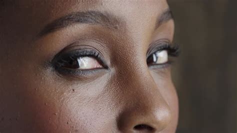 Close Up Of African American Woman Eyes Looking At Camera Wearing