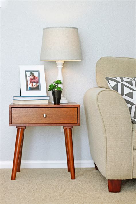 Choose personal conversation pieces that tell a story about you. How To Decorate an End Table | Jesse Coulter