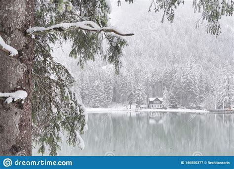 Snow Falling Over Dobbiaco Lake In Italy Europe Stock Image Image Of