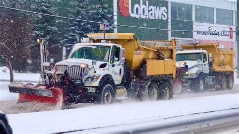 Snow Removal Trucks Plowing Snow Youtube
