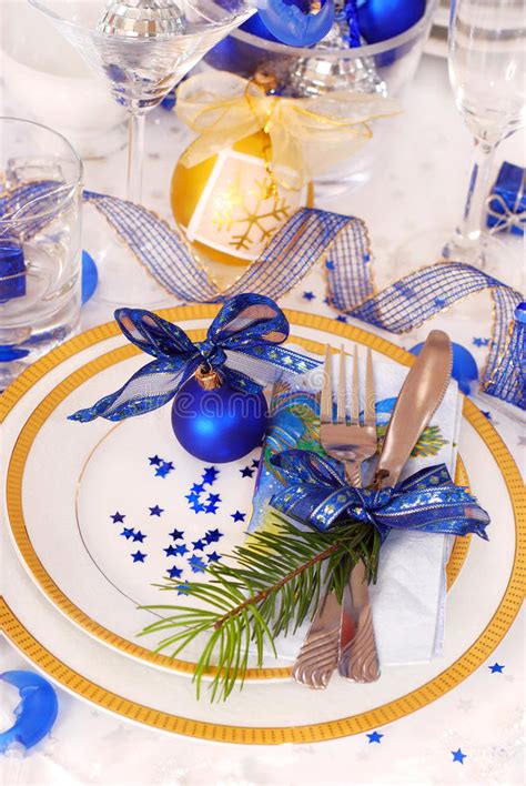 If you're looking to create a rustic christmas table setting, opt for all things plaid. Christmas Table Setting In White And Blue Colors Stock ...