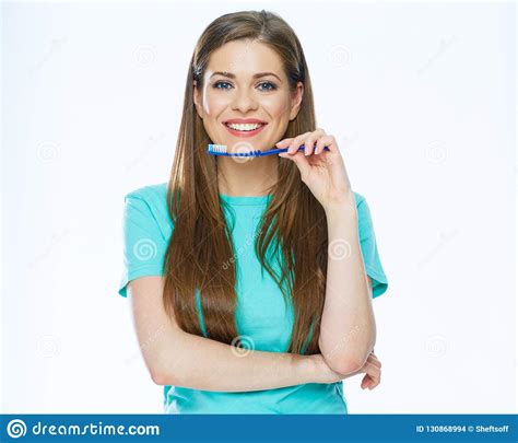 Toothy Smiling Beautiful Woman With Healthy Teeth Holding Tooth Stock