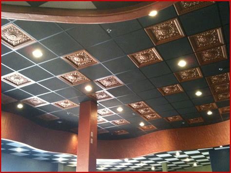 It's a grid system that holds tiles in place on the ceiling. paint drop ceiling tiles - Google Search in 2019 ...