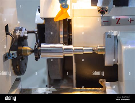 High Precision Cylindrical Grinding Machine Working On Steel Shaft Stock Photo Alamy