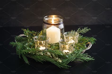 Christmas candle decoration featuring candles, christmas, and xmas