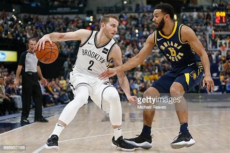 Nik Stauskas Of The Brooklyn Nets Drives Into The Lane Against Cory