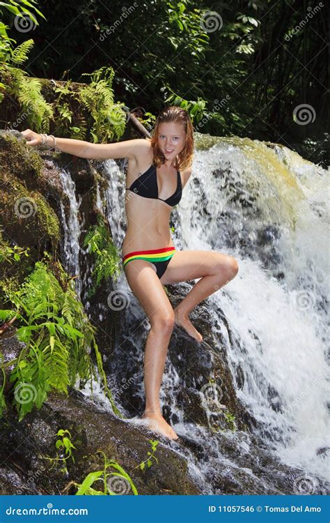 Woman By A Tropical Waterfall Royalty Free Stock Image Image 11057546