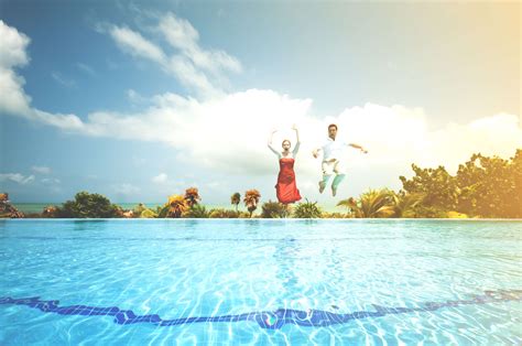 3840x2550 Couple Dress Jump Jumping Jumpshot Man Palm Trees Pool Relaxation Resort