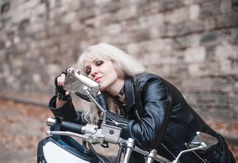 Portrait Of Beautiful Biker Woman Outdoor With Motorcycle Stock Photo