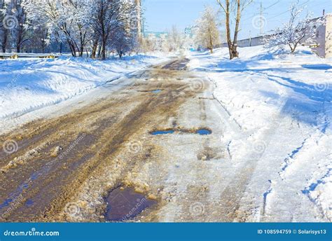Holes And Pothole On A Rural Road With Snow Stock Image Image Of