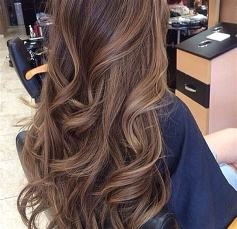 This is a warm toned balayage blond, incorporating warm dark brown at the roots and making its way to a warm platinum hue at the very ends. Best Hair Color Ideas For Women With Black To Brunette Hair