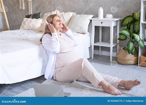 Pregnant Woman With Big Belly Advanced Pregnancy In Wireless Headphone