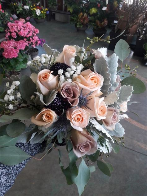 Peach And Mauve Bridal Bouquet Using Amnesia Roses Tiffany Roses