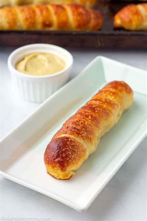 Add the baking soda to the boiling water, then, working in batches, drop the pretzel dogs into the water. Homemade Pretzel Dogs - Auntie Anne's Pretzel Dogs Copycat ...