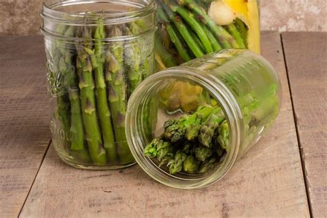 Canning Asparagus In Jars Containing Pickling Vegetable And Jar