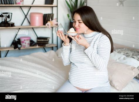 Hungry Pregnant Woman Eating Unhealthy Food Cakes Sweet Cravings During Pregnancy Concept