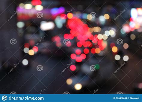 Blurred Bokeh Background Of Street Light By Car And Vehicle On The City