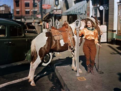 A Cowgirl Puts A Nickel In An El Paso Parking Meter To Hitch Her Pony